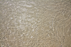 Clear water on sand